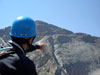 Fabio admires Chiefs Head Peak's sheer wall and the arete that splits its n...