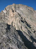 Looking up at Arrowhead Arete from the saddle between Arrowhead Peak and Mc...