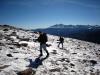Fabio and Nelson hike toward the summit with the Longs Peak massif off in t...
